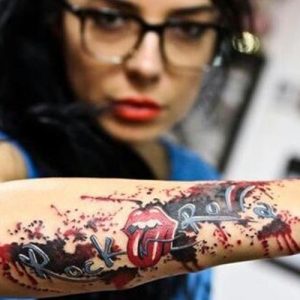Tatuajes de rock: buscando inspiración en las bandas míticas del rock. 10